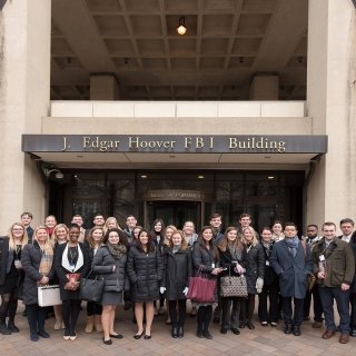 Laurentians standing in front of the FBI