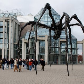 Laurentians in front of art piece