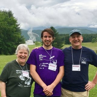 St. Lawrence faculty with a student at observatory