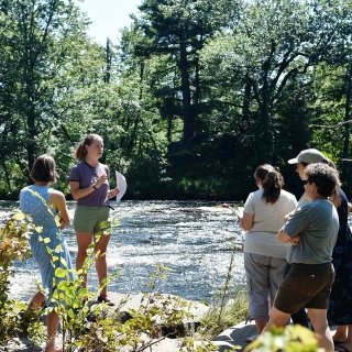 Laurentians by a body of water