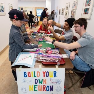 Students working with local youth