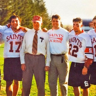 Coach with Lacrosse players