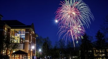 Sullivan Student Center at night with fireworks