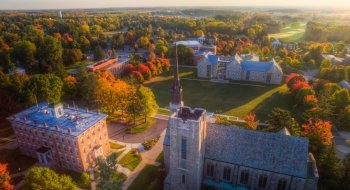 A aerial shot of the Saint Lawrence University quad, featuring the Chapel and other academic and residential buildings.