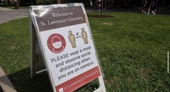 A sign welcoming guests to Saint Lawrence and outlining COVID19 safety precautions.