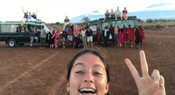 A large group of Saint Lawrence students gather for a photo while studying abroad in Kenya.