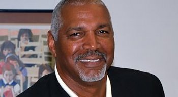 Tony Ross' headshot.