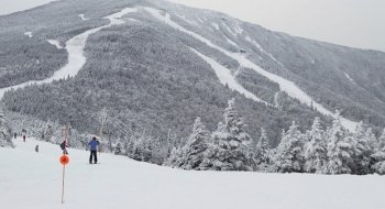 A view overlooking the ski trails on a snow-covered Whiteface Mountain.