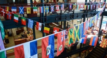 International flags drape throughout the student center.