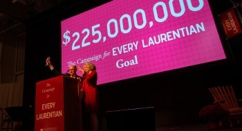 Trustees Michael W. Ranger and Sarah E. Johnson toast The Campaign for Every Laurentian goal.
