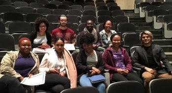 Several Saint Lawrence university students sitting in a lecture hall.