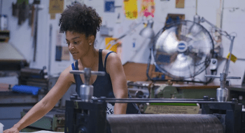 photograph of printmaker in her studio