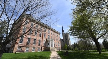 A view of the oldest building on campus on a bright, sunny spring day.