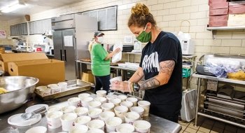 People working in kitchen