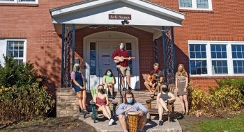 Students on the steps of the Arts Annex
