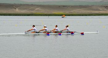 A photo of the women's rowing team in action.