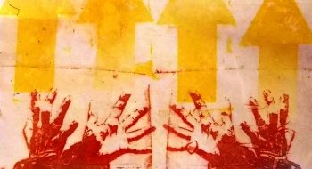 An image of paper printed with images of hands and upwards pointing arrows.