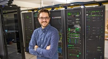 Kevin Angstadt in front of computers