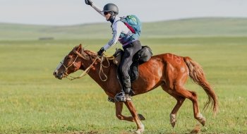 Mary Donohue riding a horse in the 2022 Mongol Derby