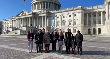 Students standing in front of the U.S. Capitol building in Washington D.C.