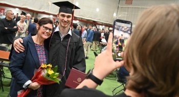 Saint Lawrence University graduate celebrating with his family