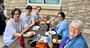 St. Lawrence students and faculty enjoying a barbecue outside Johnson Hall of Science