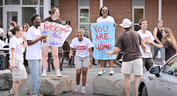 Saint Lawrence University Orientation Leaders welcoming students to their new home on move-in day