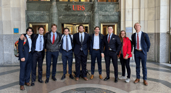 Members of the St. Lawrence Fed Challenge team in front of UBS bank in New York City