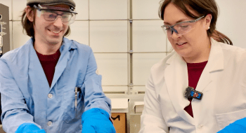 Assistant Professor of Chemistry Patrick Lutz and Lauren Jesmaine '26 conducting an experiment that submerges sprinkles in liquid nitrogen