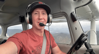 Nate Ward flying a plane.
