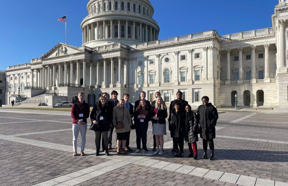 Students standing in front of the U.S. Capitol building in Washington D.C.