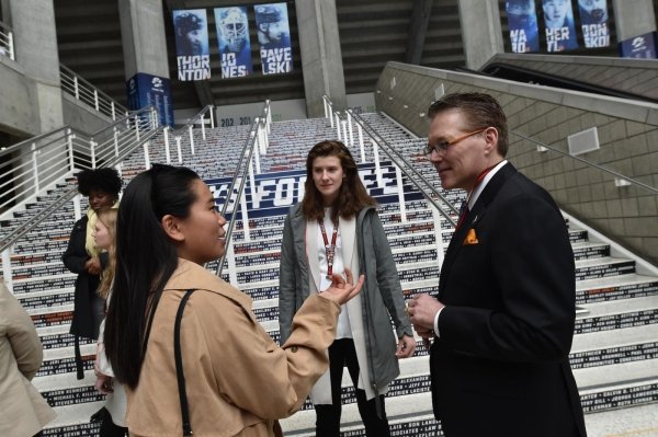 Alumnus speaking to students