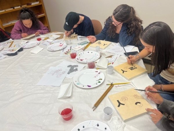 students painting