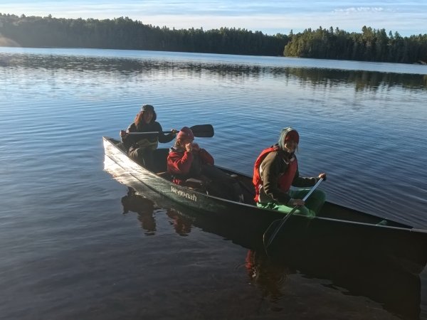 Jacqui Smith serenades Emily Campbell and Jordanna Samburgh as they paddle across the lake.