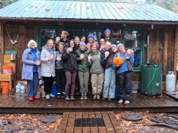 Group photo with Kate Morris, President of St. Lawrence University, and Diane Husic, Director of the St. Lawrence University Center for the Environment.