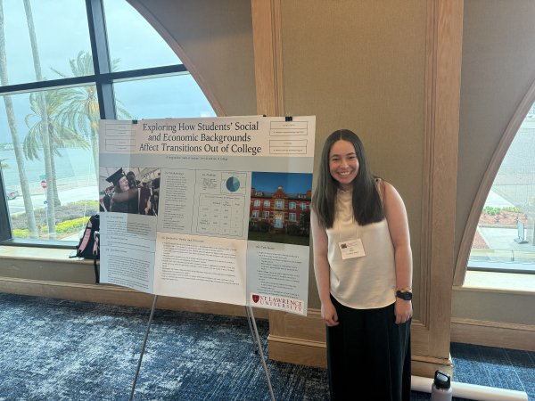 Student presenting poster 