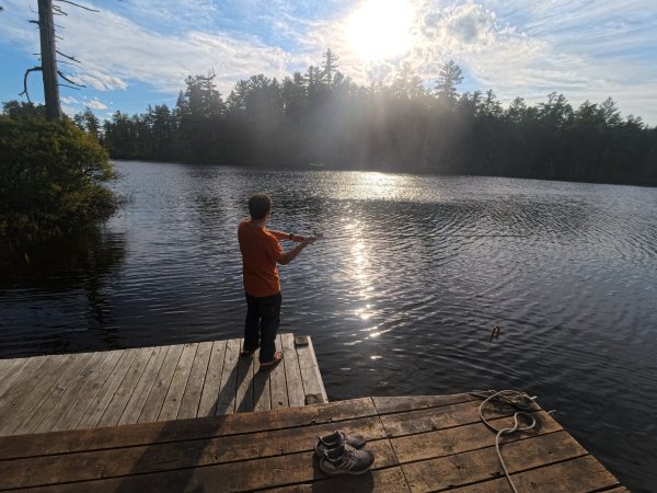 Luke McChesney fishing from the Barge Dock.