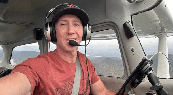 Nate Ward flying a plane.
