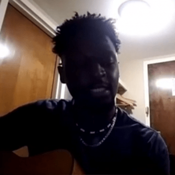 A Saint Lawrence student plays guitar during the Black Laurentian Initiative virtual event honoring and reflecting on the life of The Reverend Dr. Martin Luther King Junior.