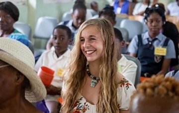 Kelsey Murphy at the opening ceremony for a new school library, which she helped develop with fellow teachers.