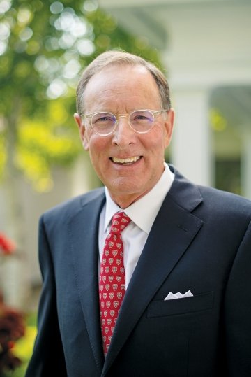 A photo of President William Fox smiling.
