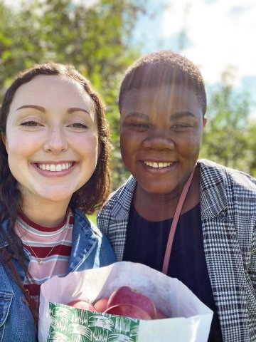 Two Laurentians with a bag of apples