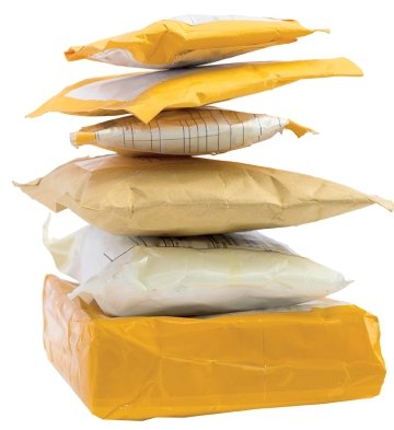 A photo of packages stacked on top of one another.