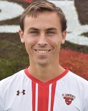 Headshot of Bobby Reynolds, class of twenty-twenty-two. Wearing a scarlet and white soccer jersey.