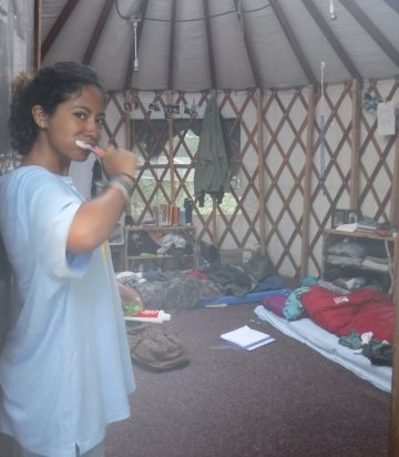 Early morning routine while … off the coziness of her yurt.