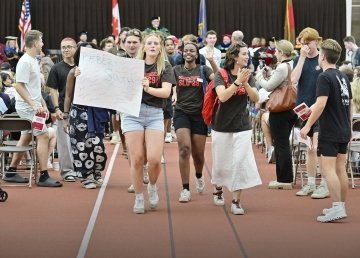 Students leaving Saint Lawrence University Matriculation to begin a weekend of Orientation activities