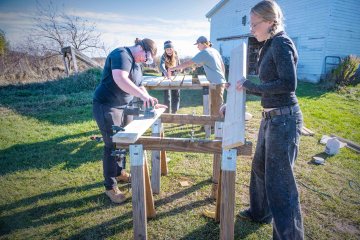 Students working on the greenhouse