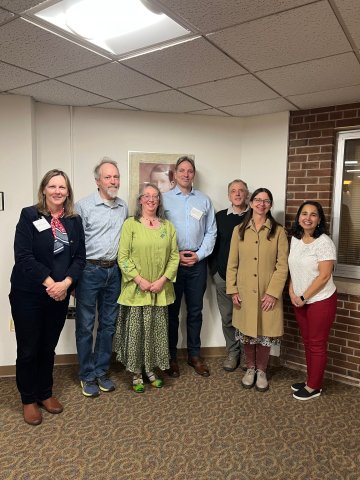 Church Family picture with presenter