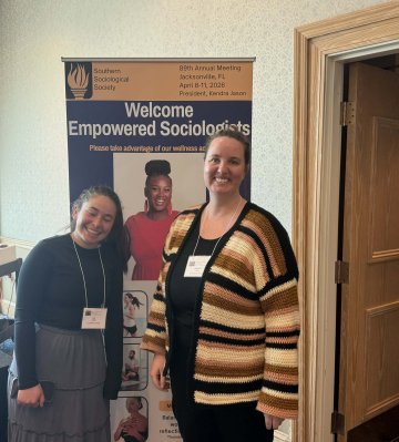Lily Welch and Dr. Gillis at conference