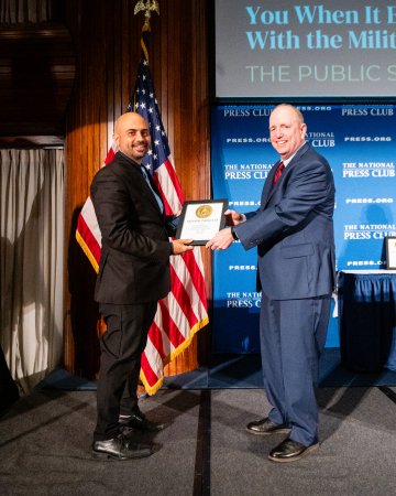 Habib Battah with President Mark Schoeff Jr. CQ Roll Call of National Press Club F26